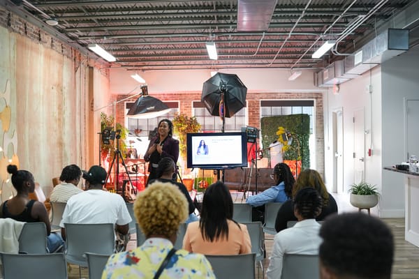 Community of entrepreneurs supporting each other at a conference