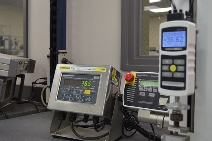 Industrial floor scale in operation at a manufacturing facility, supplied by Michelli Weighing & Measurement