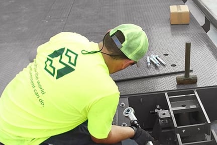 Michelli technician performing a truck scale installation