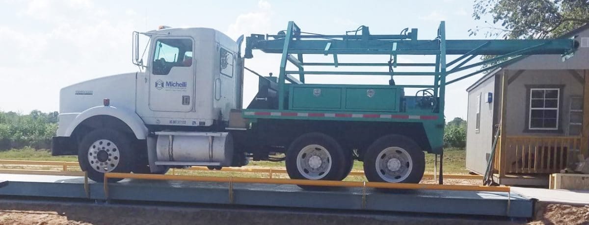 Michelli Weighing & Measurement heavy-capacity test truck used for truck scale calibration at a chemical or petrochemical facility