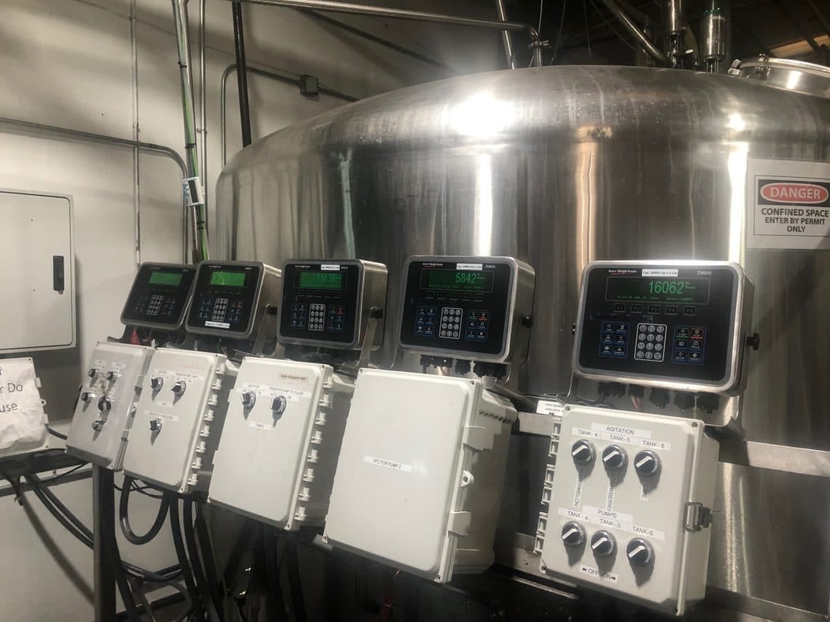 Industrial control panels in a brewery for batching and setpoint batch control systems