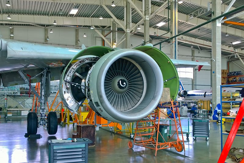 Michelli Weighing & Measurement technician supporting aerospace precision measurement and calibration work in a hangar environment