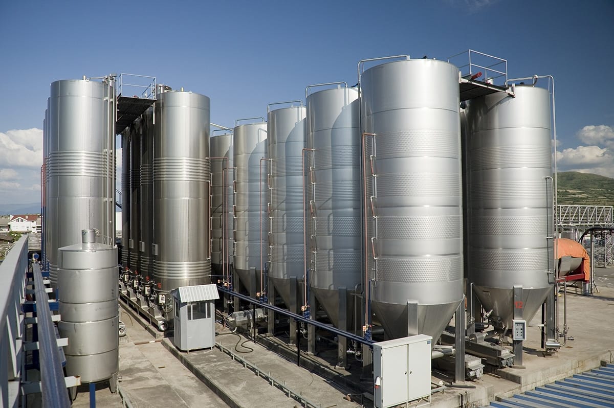 Michelli Weighing & Measurement technician supporting chemical and petrochemical process weighing equipment at an industrial facility