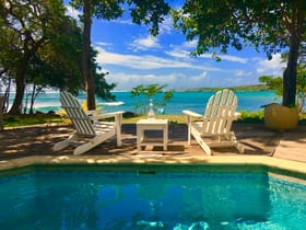 Petit Point Bungalow pool deck overlooking Tobago lagoon