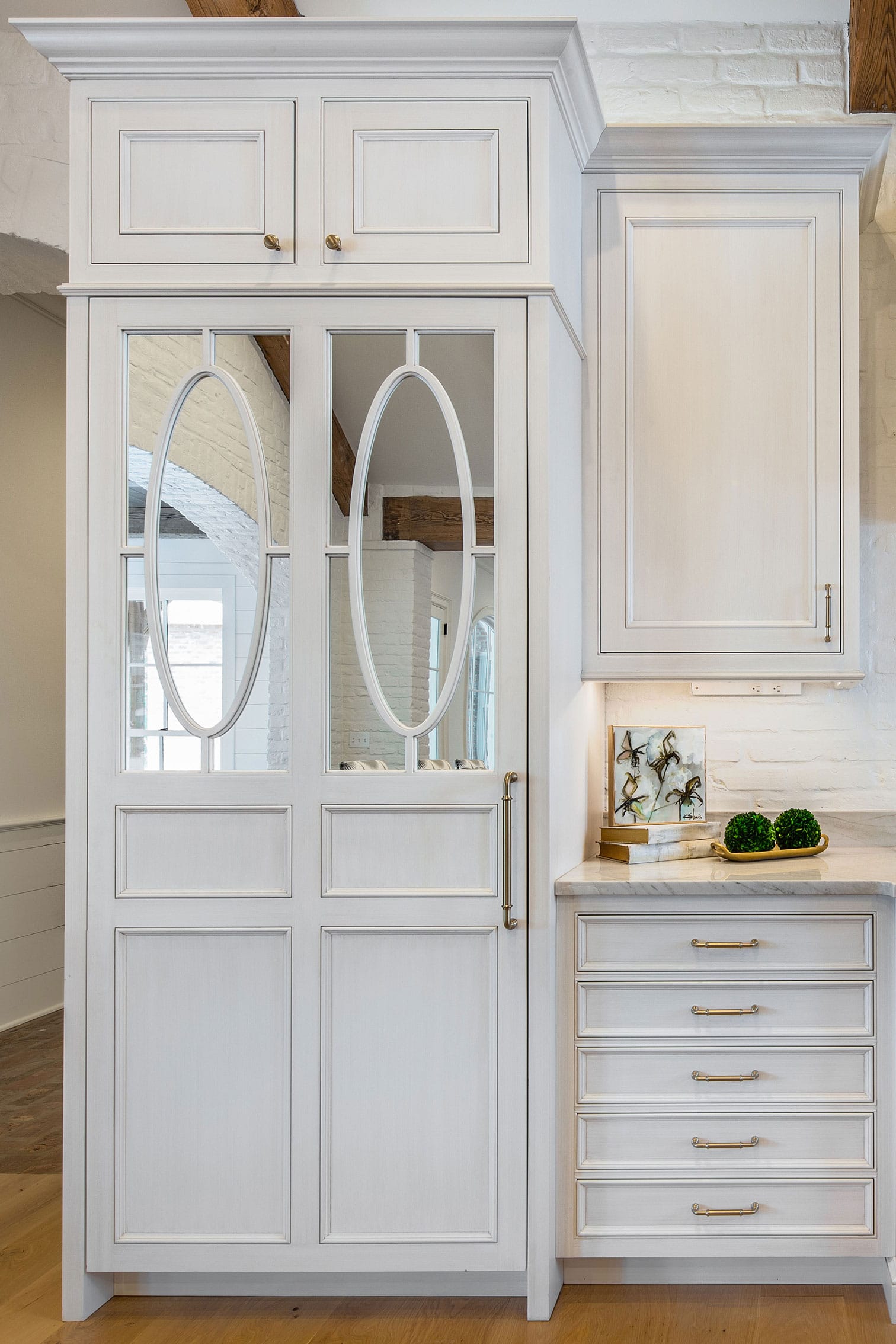Graff kitchen project with premium finishes and custom island by The Cottage