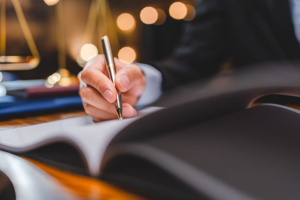 Person writing in a notebook