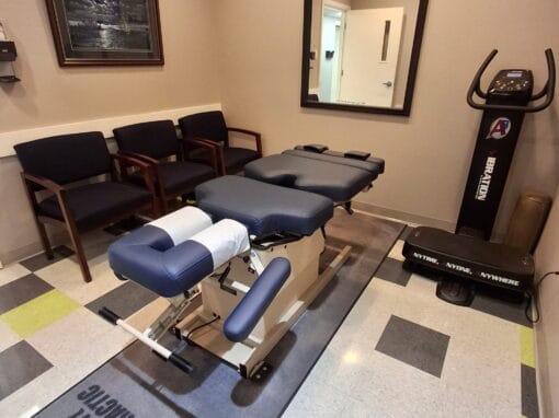 Treatment room with chiropractic equipment
