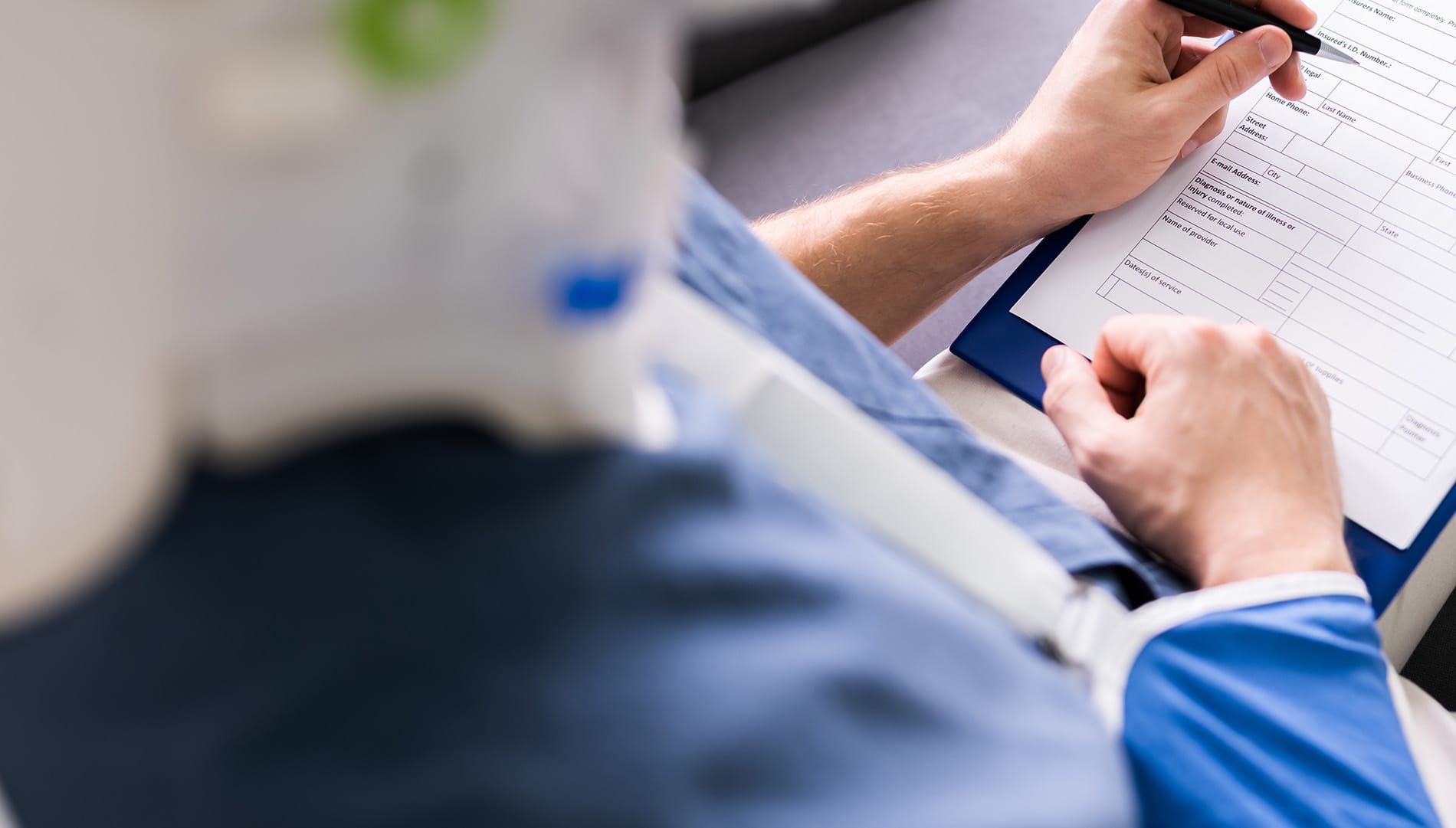 Patient completing paperwork